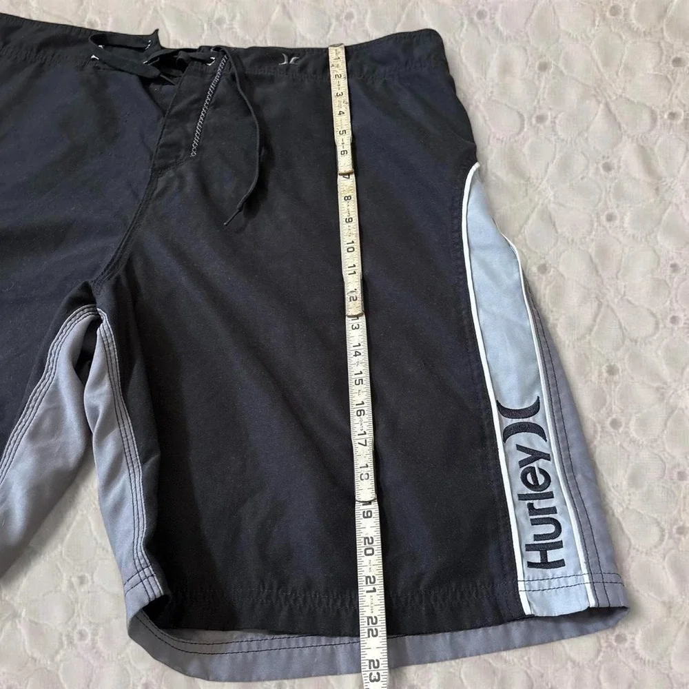 Hurley black and grey board shorts with gray side panels, size 38/XL